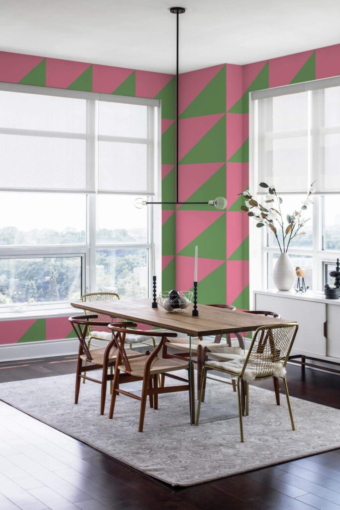 Picture of a dinning room with a green and pink wallpaper and wooden dining table.