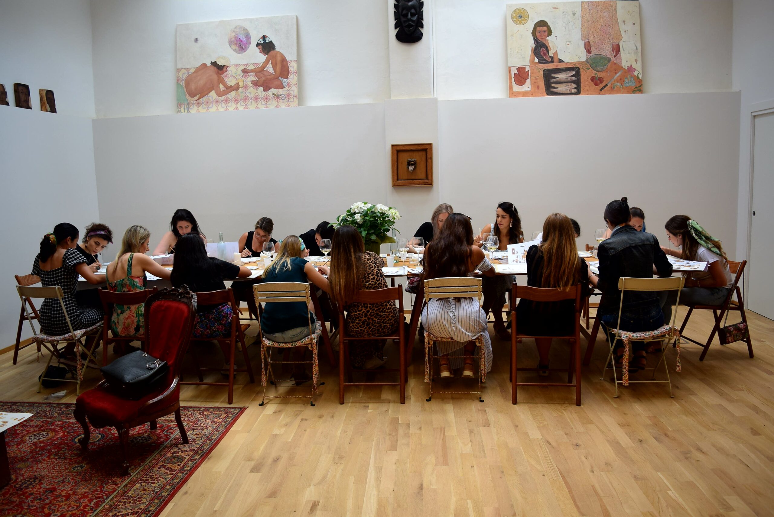 A picture of an art event in an art gallery.