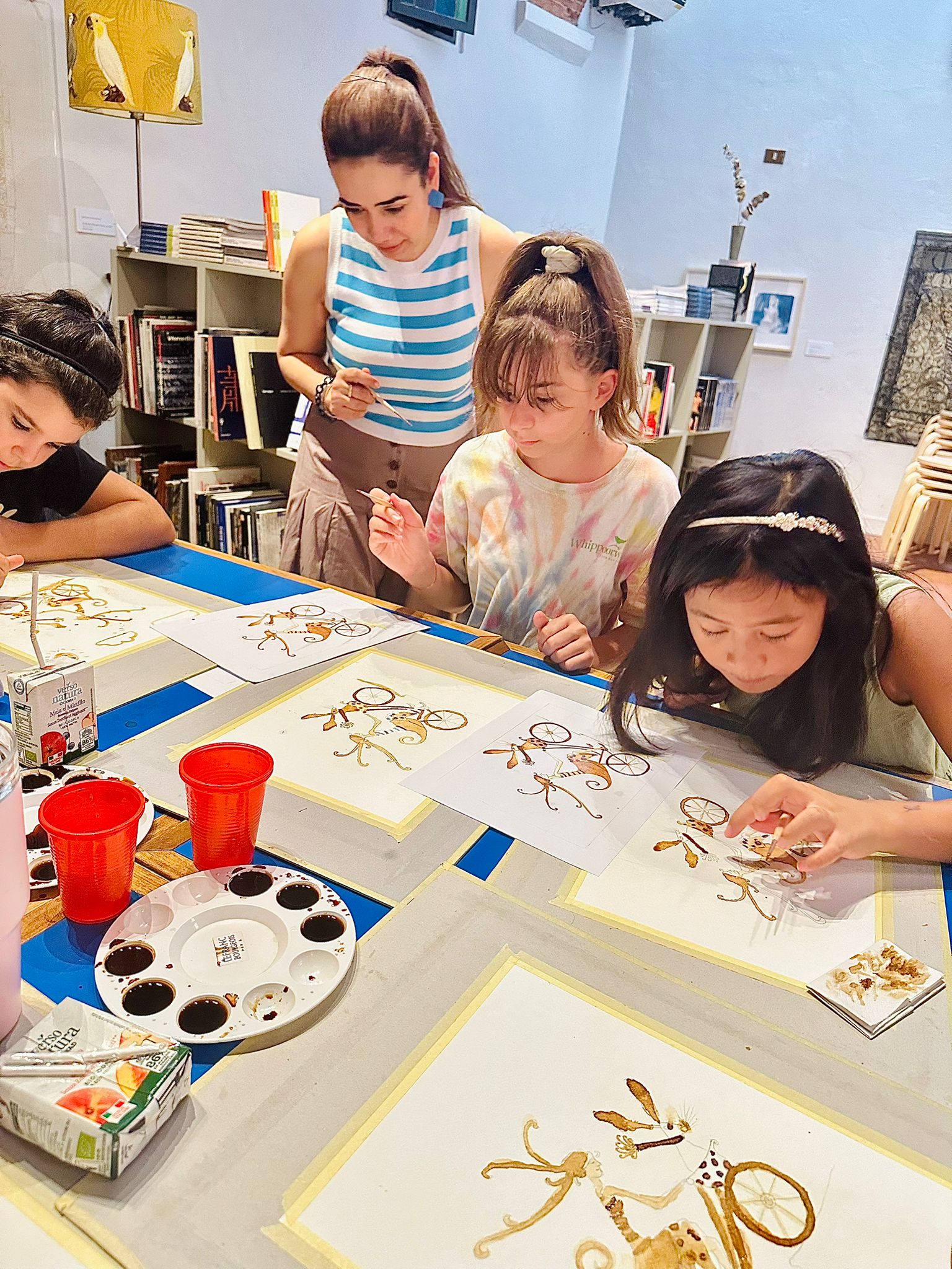A picture of kid's painting workshop.