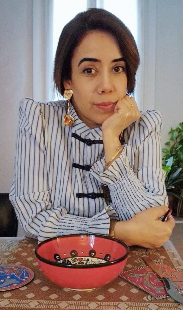 Picture of the author with a red bowl.