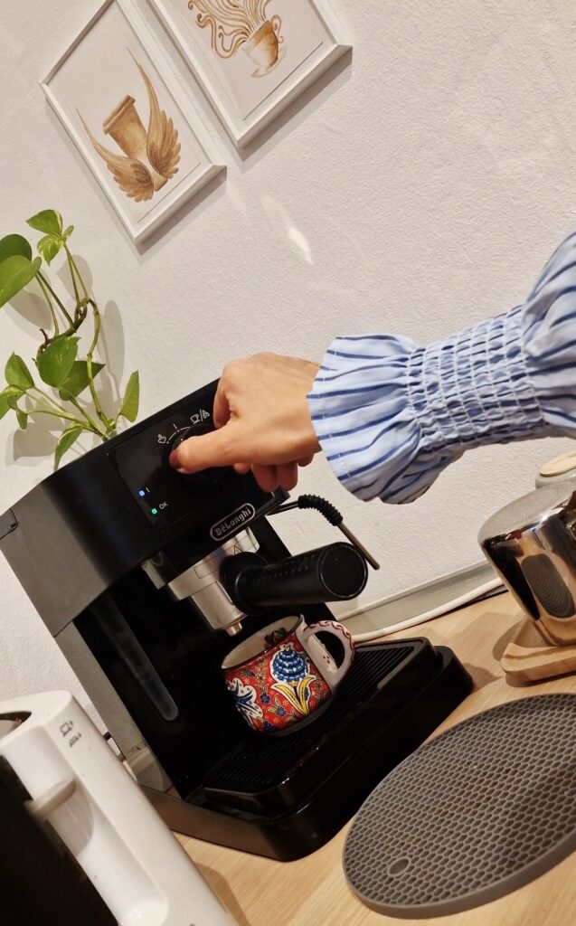 A black Nespresso machine.