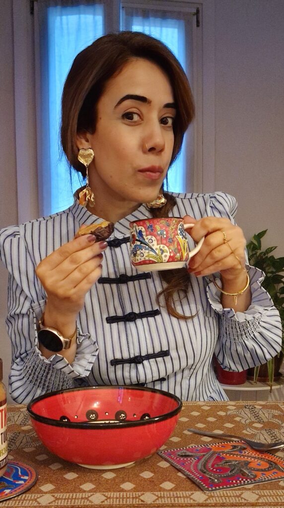 Picture of author having coffee and a snack.